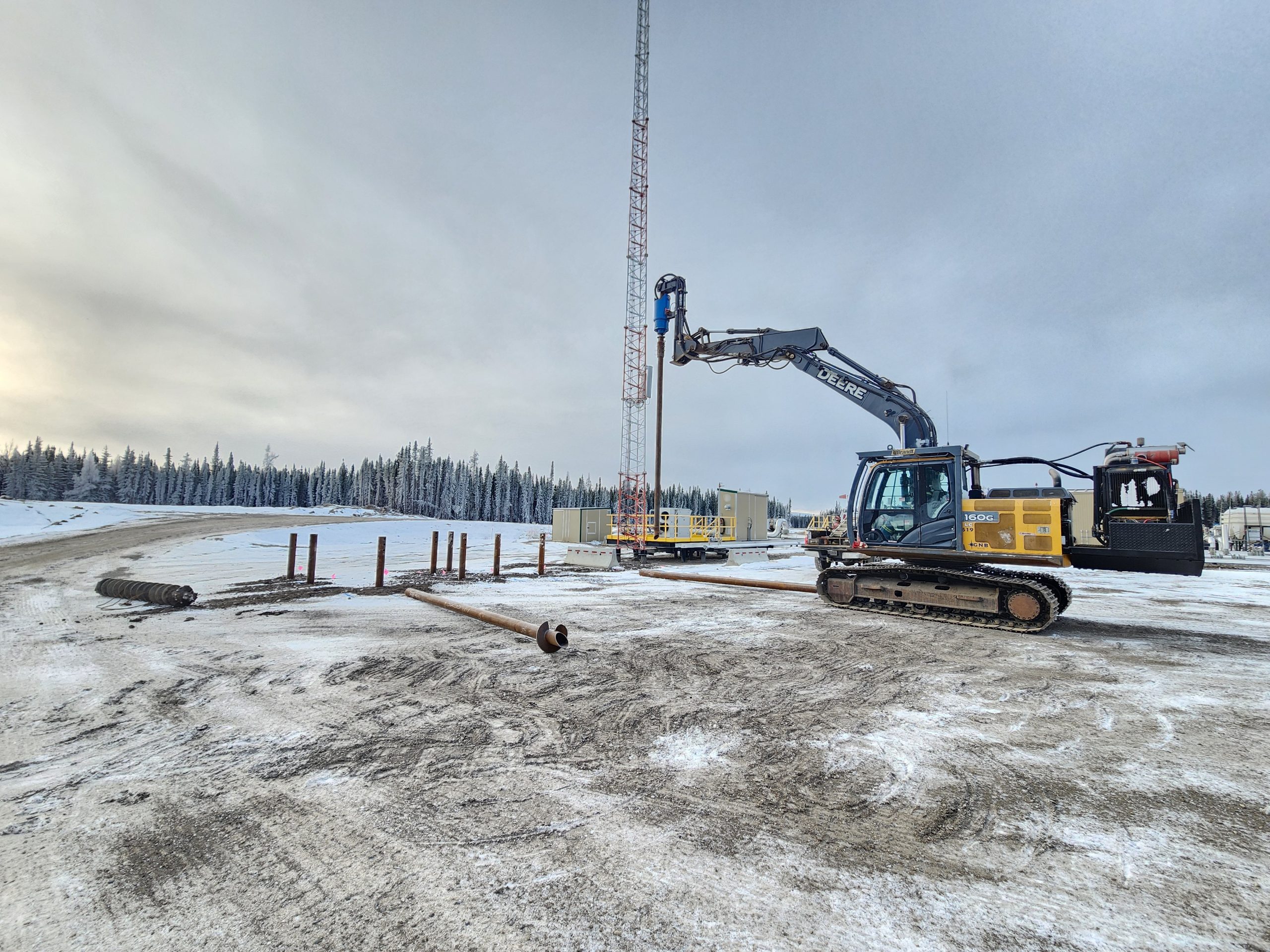 pile driving company crew working in remote access conditions